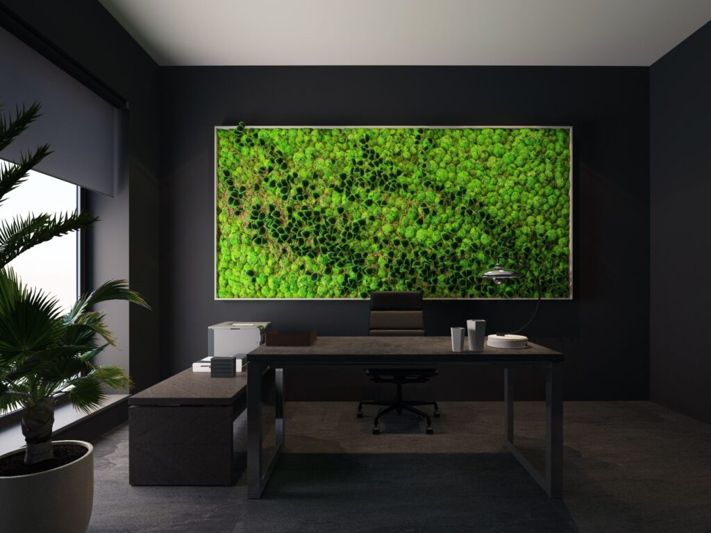 Employee wellbeing design showing a moss wall as a feature in an office