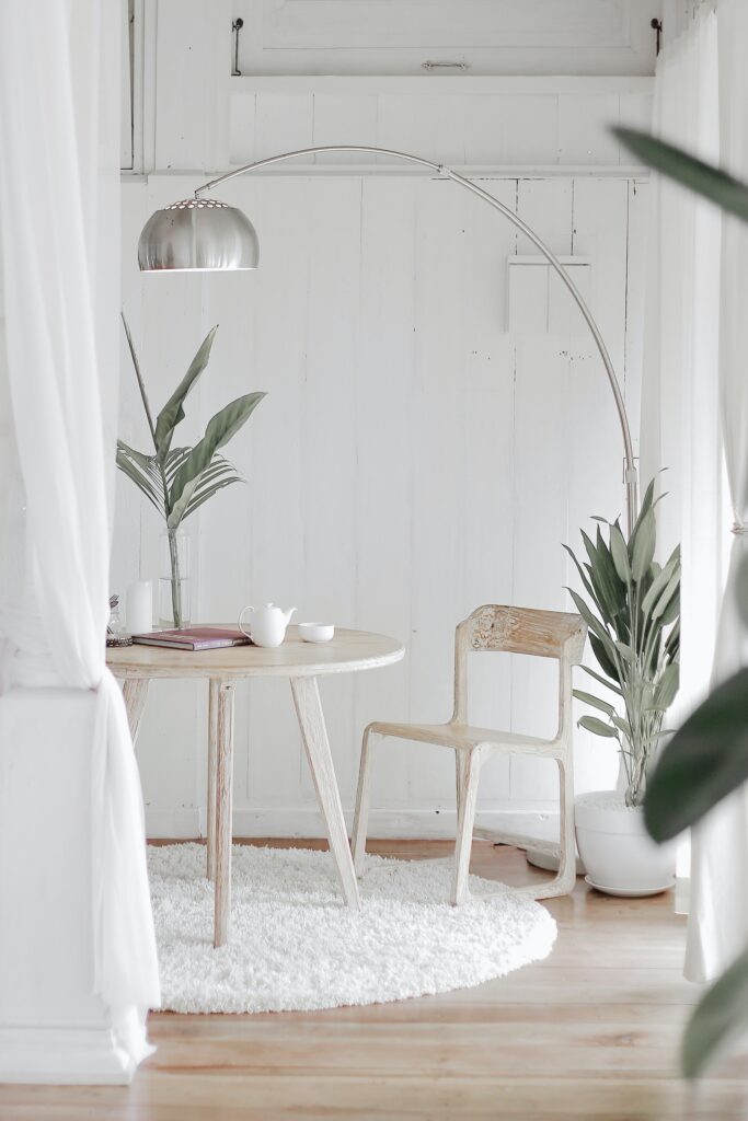 Clam white seating area with white furniture