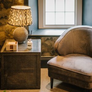 Attic bedroom conversion seating area with natural light