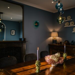 Dining room renovation with rich deep colours and handmade furniture