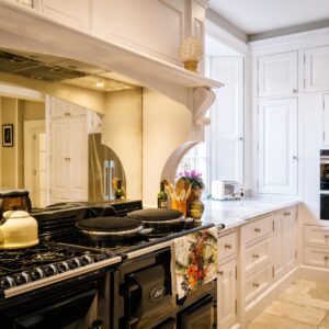 Black Aga with foxed glass splash back