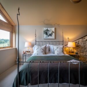 Bedroom with a double bed and side tables
