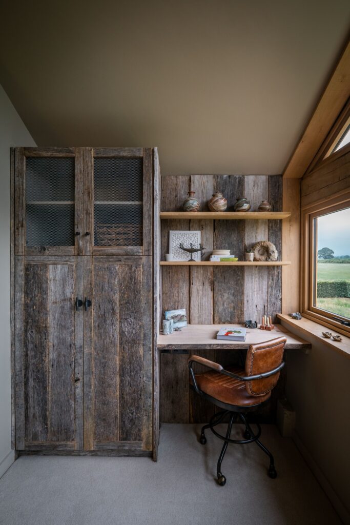 Bedroom with bespoke wardrobe and work area