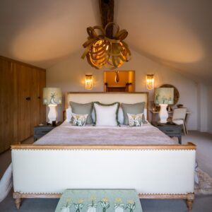 Nature and Spring design inspired master bedroom with emperor bed and oak bent pendant light