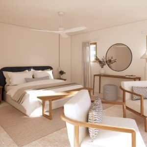 3D render set within a Menorcan villa, showing a calm bedroom with a dark upholstered bed and layered neutral linens, pendant bedside lights, ceiling fan, two upholstered lounge chairs on a rug, a slim console with round mirror, and soft daylight through timber-framed windows with white curtains.