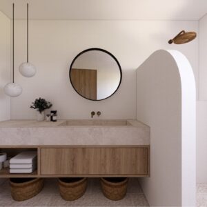 Minimalist 3D render of a Menorcan villa bathroom with a floating timber vanity, stone countertop basin, round mirror, brass wall tap, pendant lights, and an arched shower niche with rainfall shower head.