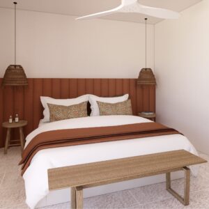 Warm-toned 3D render of a Menorcan villa bedroom with a terracotta upholstered headboard, white bedding with rust throw, woven pendant bedside lights, timber side tables, and a wooden bench at the foot of the bed.