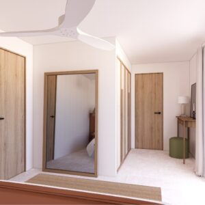 Bright 3D render of a Menorcan villa bedroom showing timber doors, a full-length mirror, built-in wardrobes, ceiling fan, dressing desk with lamp and green pouffe, and large sliding glass doors with sheer curtains.