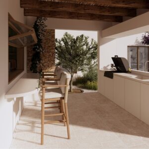 Atmospheric 3D render set within a Menorcan villa, showing a shaded outdoor kitchen terrace with timber pergola beams, built-in white cabinetry and sink, a barbecue, bar seating, an olive tree courtyard, and bougainvillea climbing the wall in warm sunlight.