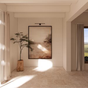 3D render set within a Menorcan villa, showing a calm, sunlit hallway with pale plaster walls, exposed ceiling beams, large timber-framed glazing with sheer curtains, a framed landscape artwork with a slim picture light, and a small potted tree on a stump-style planter, opening through an archway to a curtained window with countryside views.